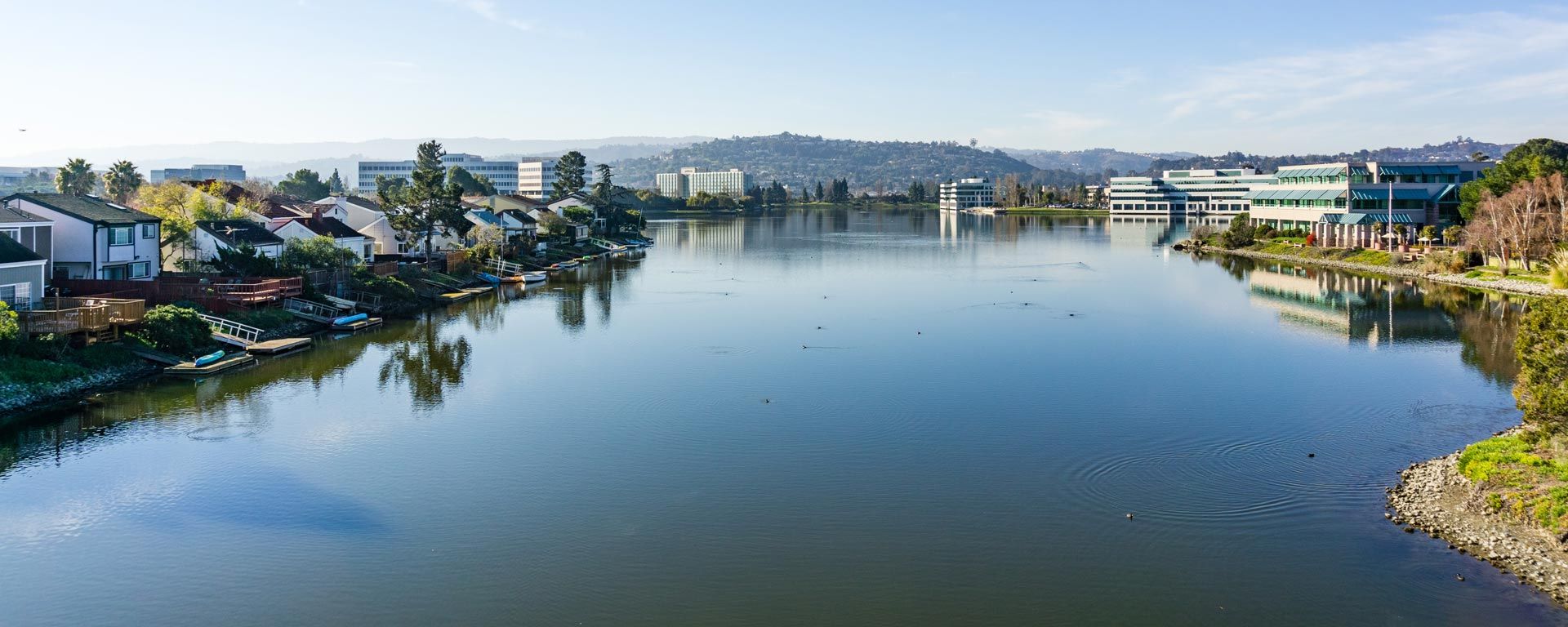 Redwood shores lagoon with businesses and houses in view
