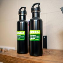 reusable water bottles with Green Business logo at Brush Hog Tree Care in Half Moon Bay