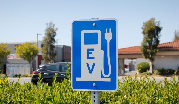 Electric vehicle charging sign