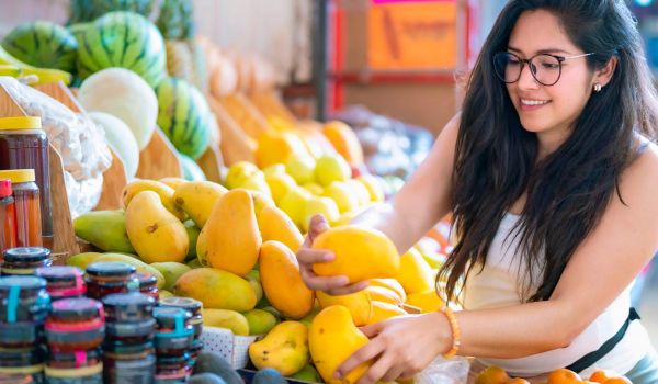 woman shopping for fresh produce