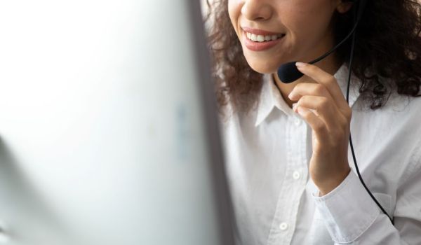 Customer service representative talking on headset