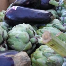 box of artichokes and eggplants