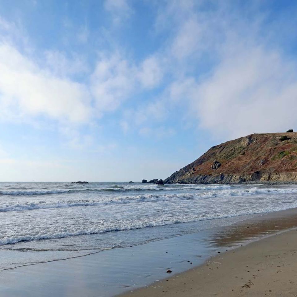 waves rolling onto Pacifica State Beach sand