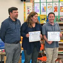 two teachers receiving Green Star School Award