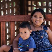 brother and sister at playground benefit from Community Climate Action Plan