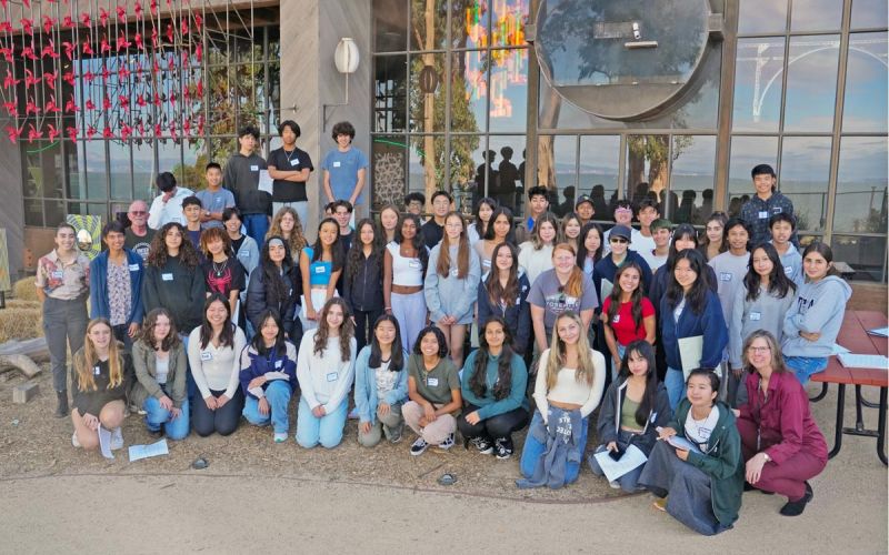Youth Climate Ambassador Leadership Program retreat group photo with 54 students plus staff posing in front of building