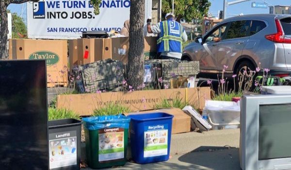 boxes for collection at an electronic recycling drop-off event in Foster City