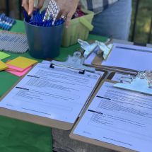 Coleman Ringwood Transportation Study public surveys on clipboards at event table