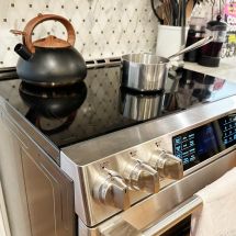 energy-efficient electric induction stovetop range in home kitchen