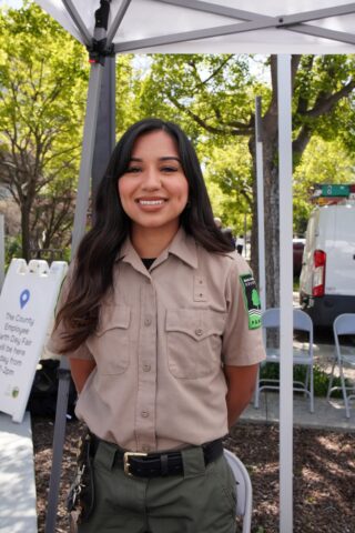 Photo of a park ranger at a tabling event.