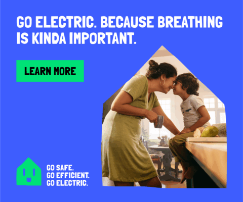 An ad for the Go Electric! Campaign showing a mom and child at home, with the tagline: Go electric. Because breathing is kinda important.
