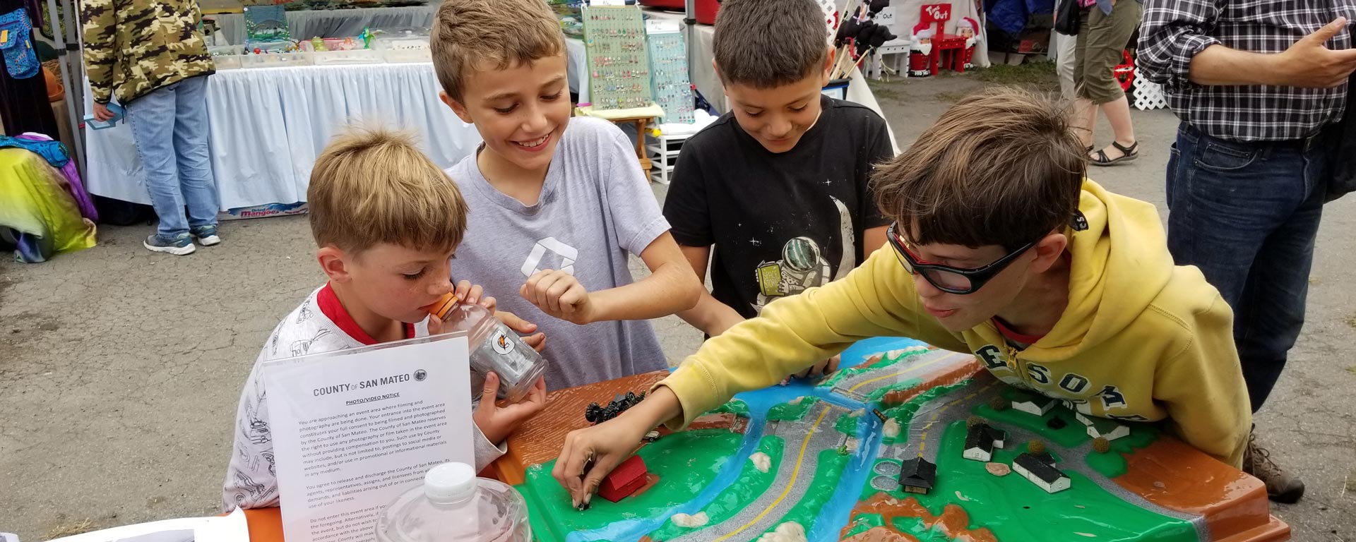 children learning about watersheds and pollution prevention